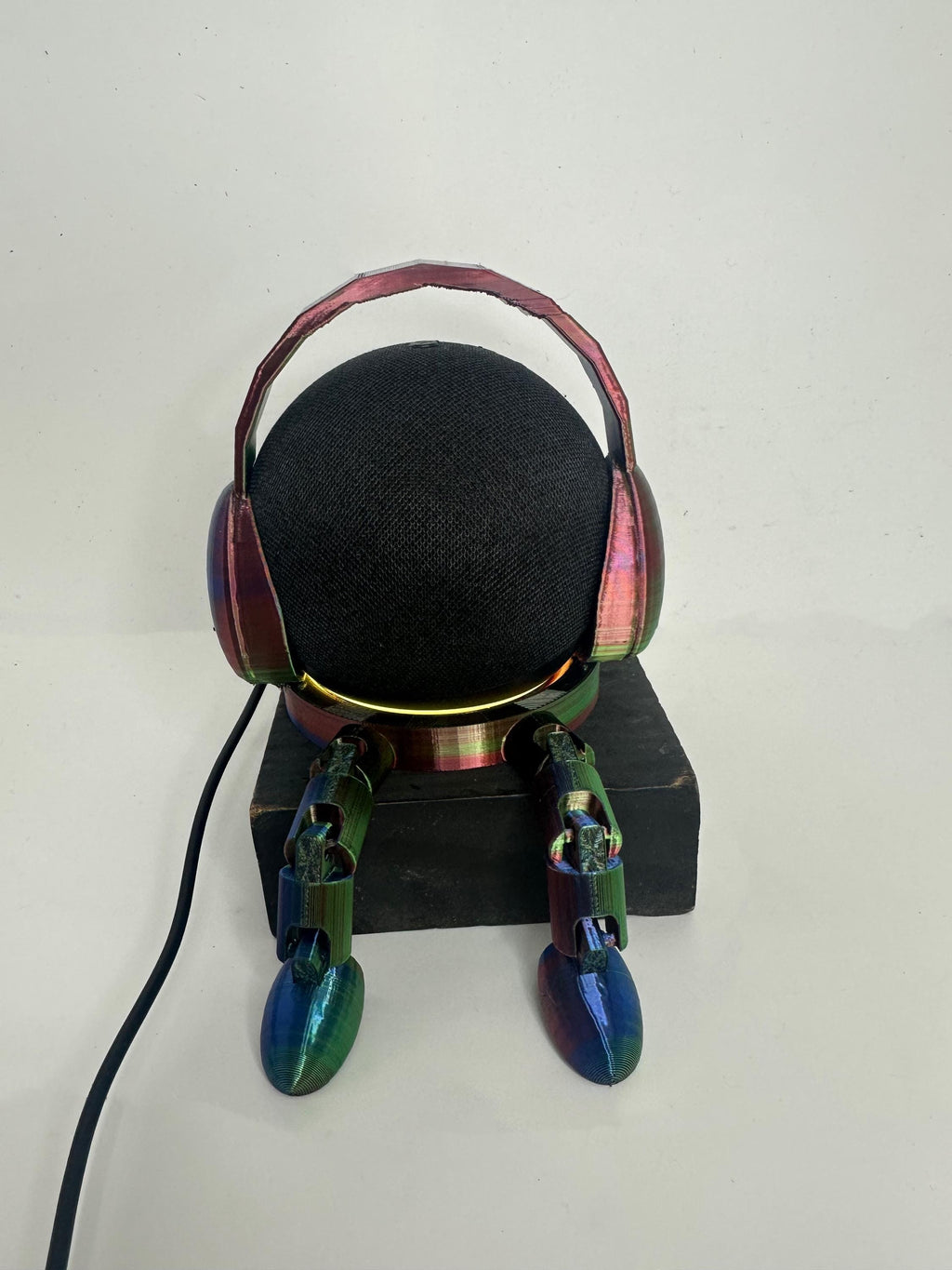 Echo stand with legs and headphones