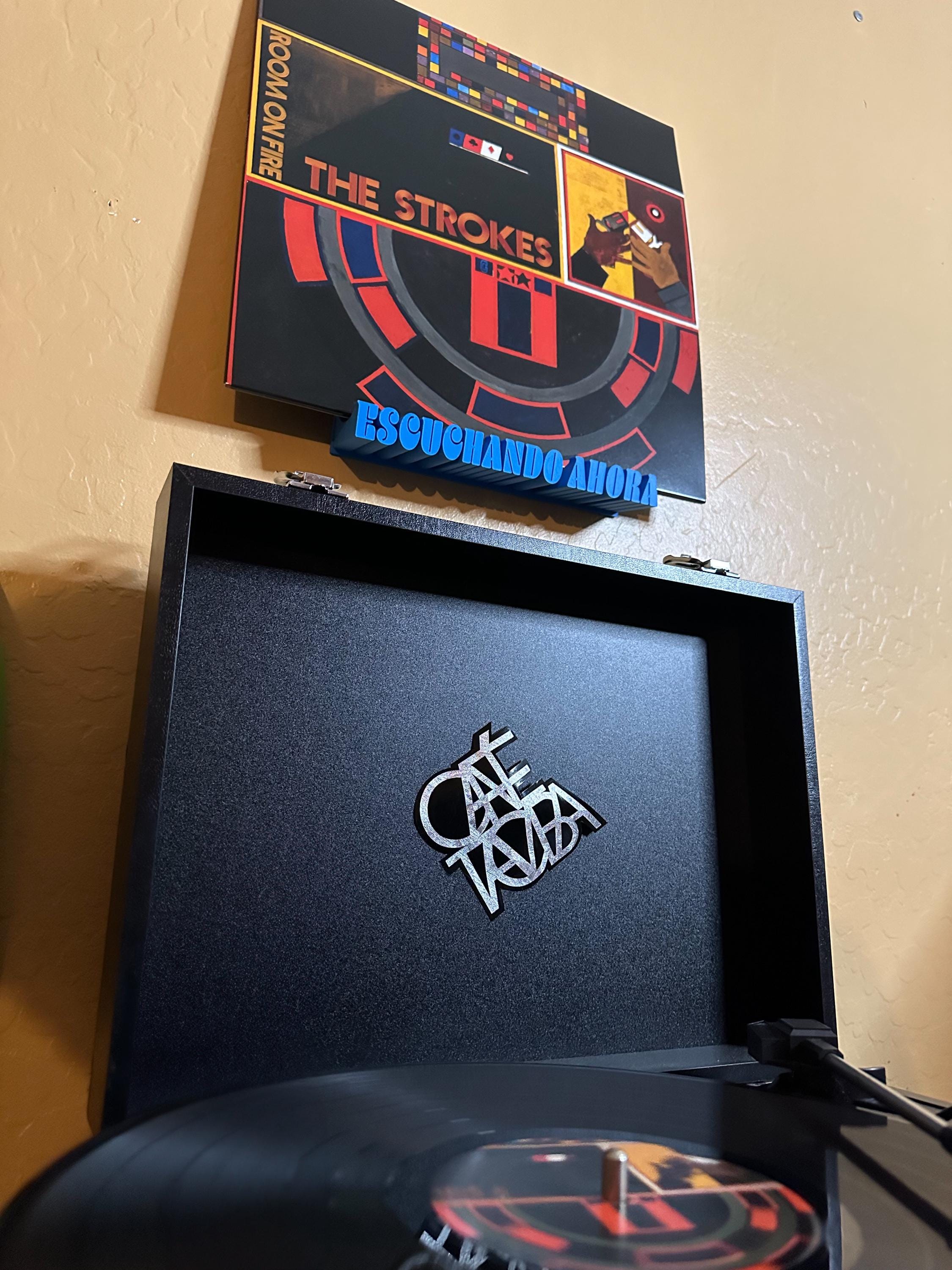 Soporte para discos (Record holder)